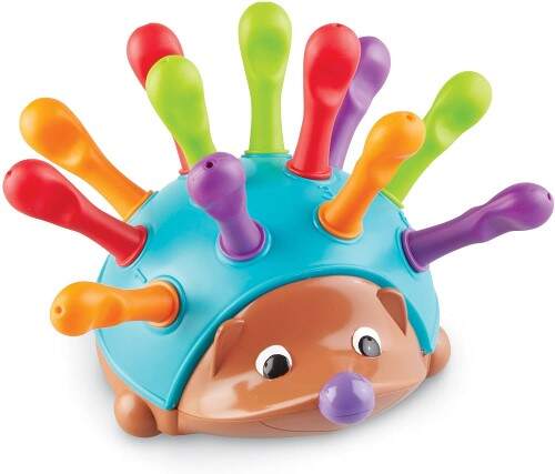 Este juguete de erizo es ideal para practicar la motricidad fina. 
                             Para niños desde 18 meses.